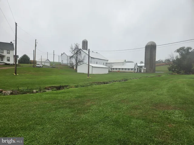a view of an ocean and city