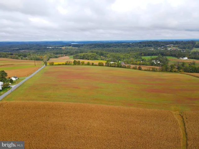 a view of an ocean and city