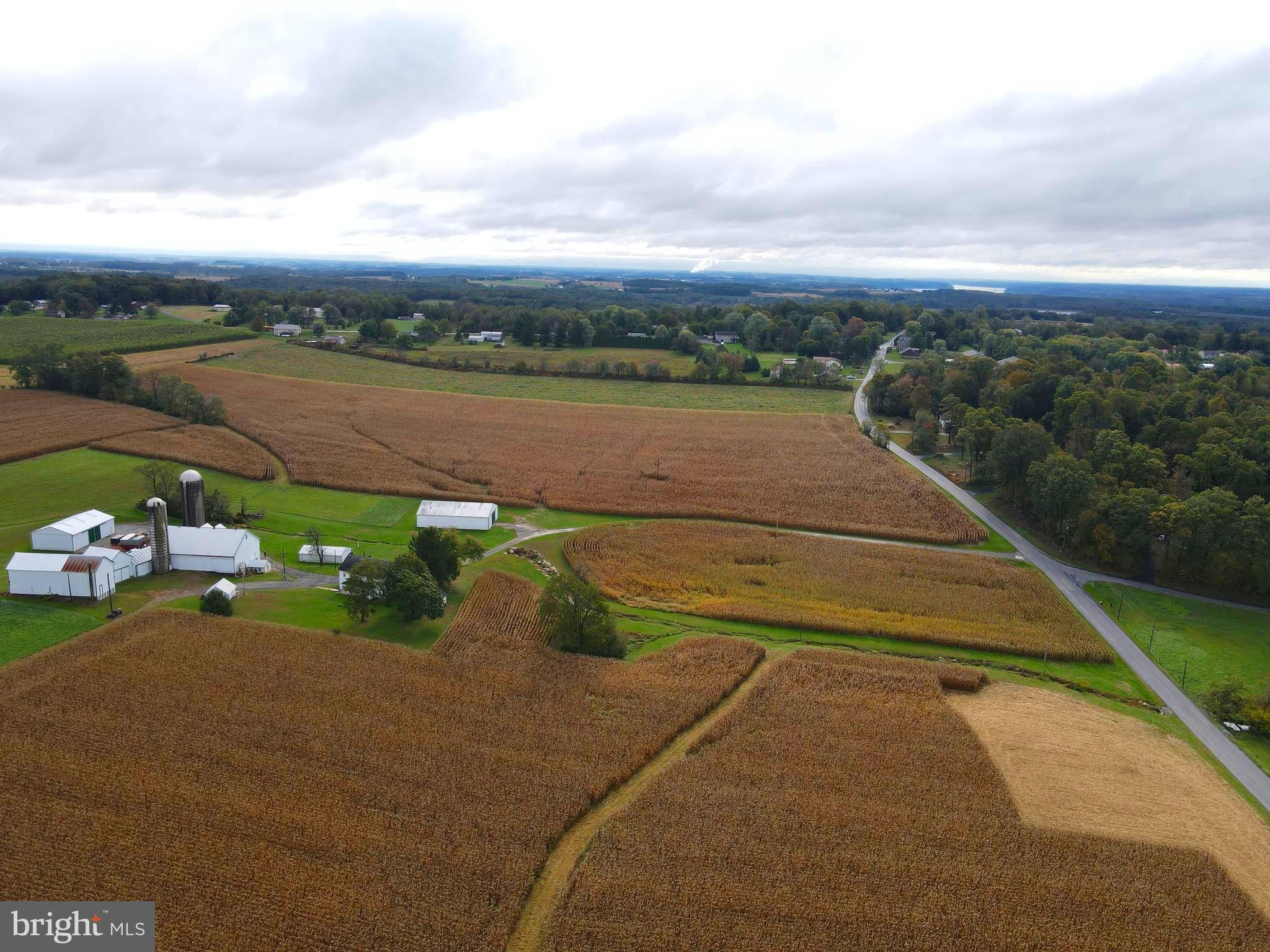 888 Hilldale Road Holtwood, PA 17532 - Photo 10 of 47 a view of a lake with a car park in front of it