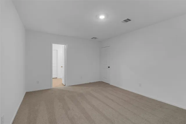 a bathroom with a sink toilet and vanity