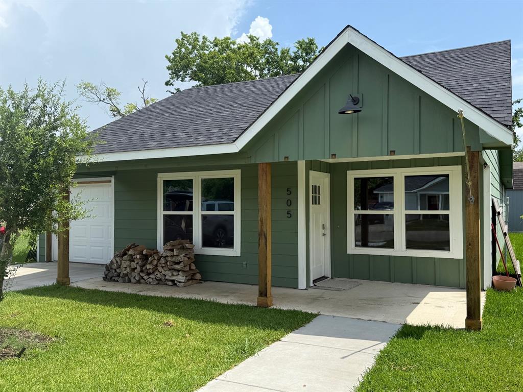 505 Thomas Street Terrell, TX 75160 - Photo 1 of 38 Green board and batten siding with white trim