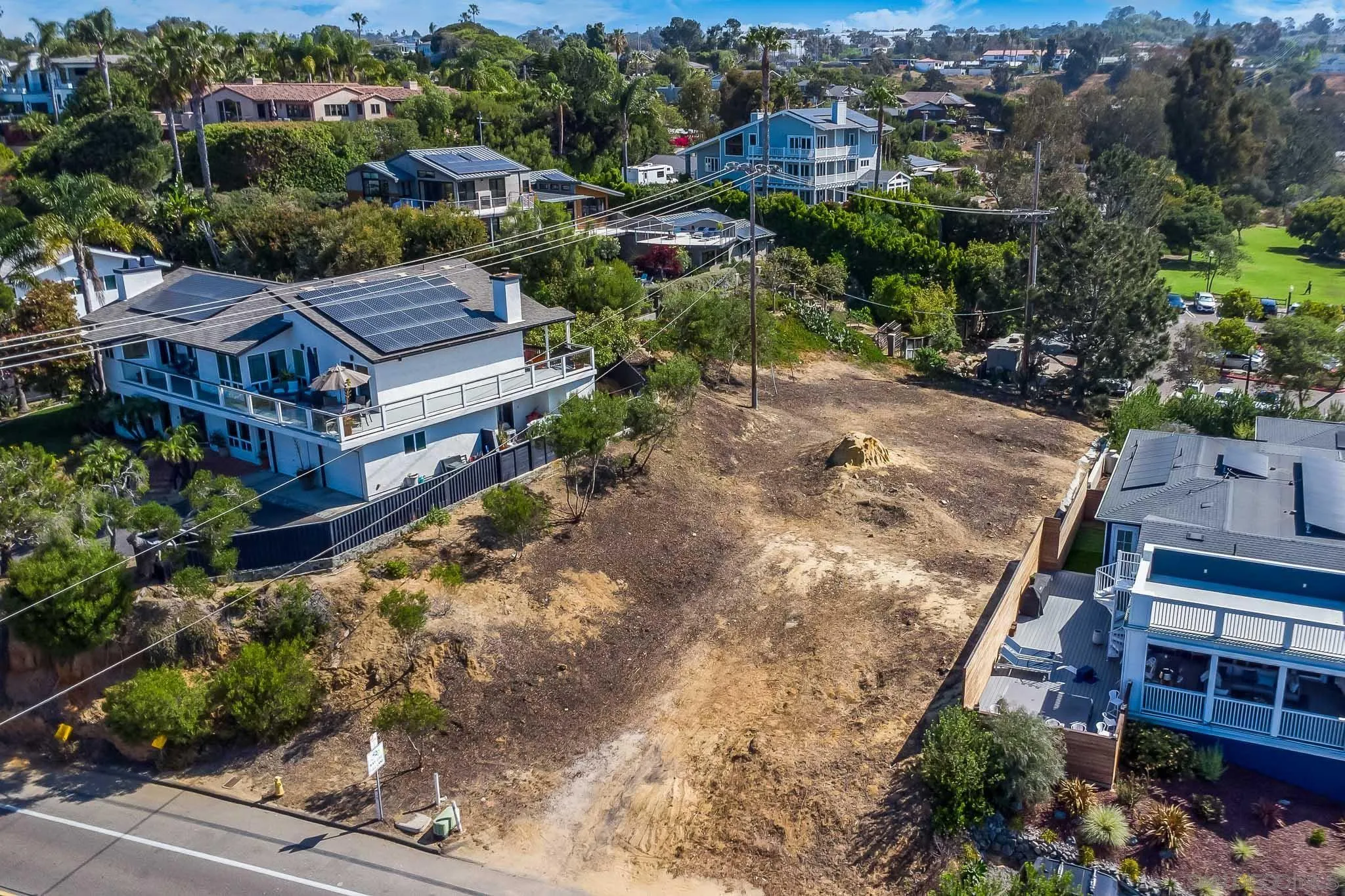 97 North Vulcan Avenue, Unit 3 Encinitas, CA 92024 - Photo 4 of 19 an aerial view of multiple houses with a yard