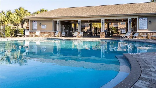 a view of house with outdoor seating