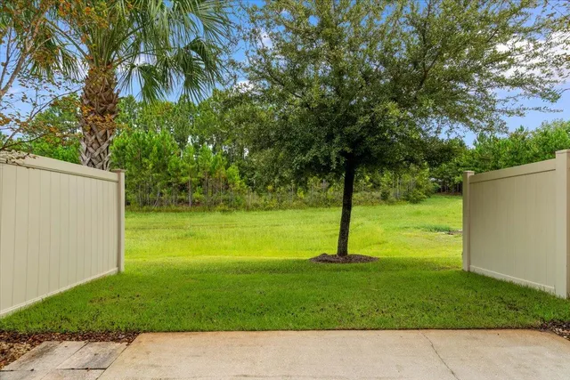 a view of a backyard with a small cabin