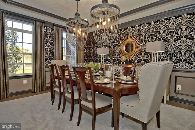 a living room with furniture fireplace and flat screen tv