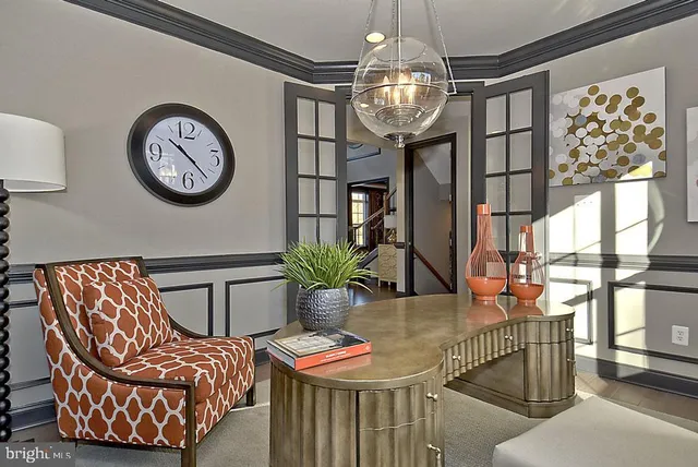 a bedroom with a bed and a night stand