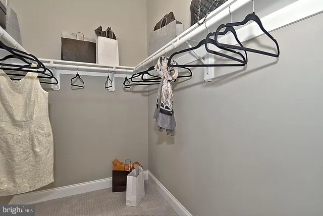 a room with multiple dryer and washer