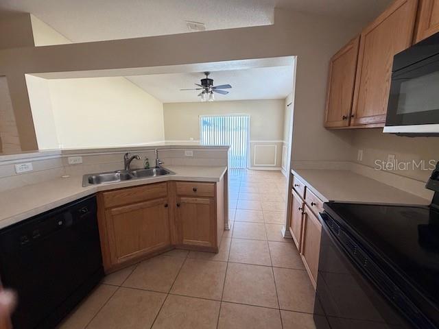 2551 Hunley Loop Kissimmee, FL 34743 - Photo 19 of 24 a kitchen with a sink and cabinets