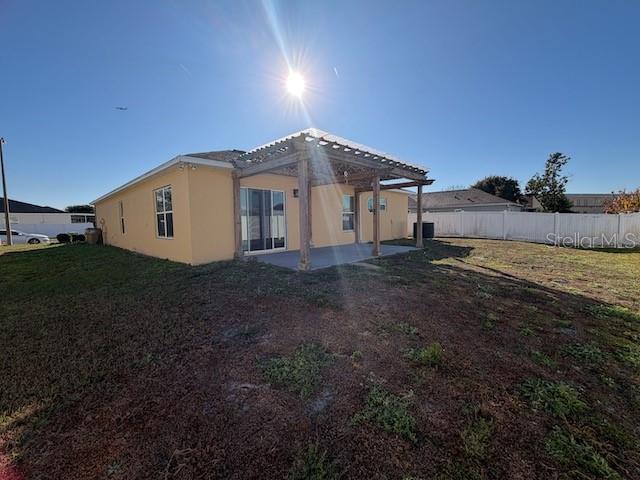 2551 Hunley Loop Kissimmee, FL 34743 - Photo 22 of 24 a view of a house with a yard