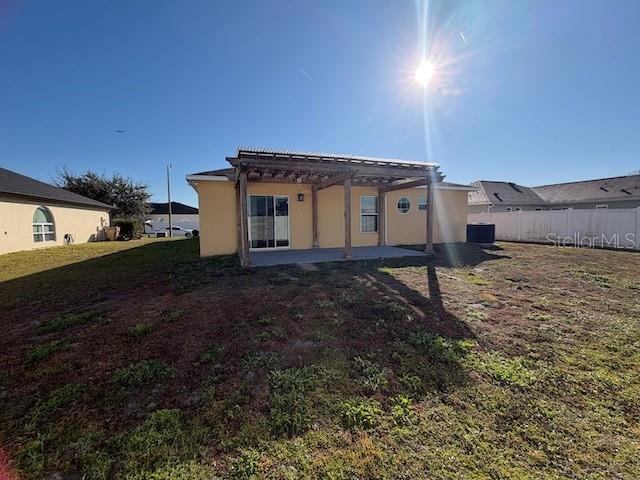 2551 Hunley Loop Kissimmee, FL 34743 - Photo 23 of 24 a view of a house with a yard
