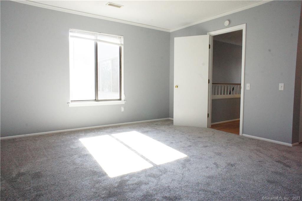 2 Juneberry Lane, Unit 2 Ridgefield, CT 06877 - Photo 12 of 29 an empty room with windows