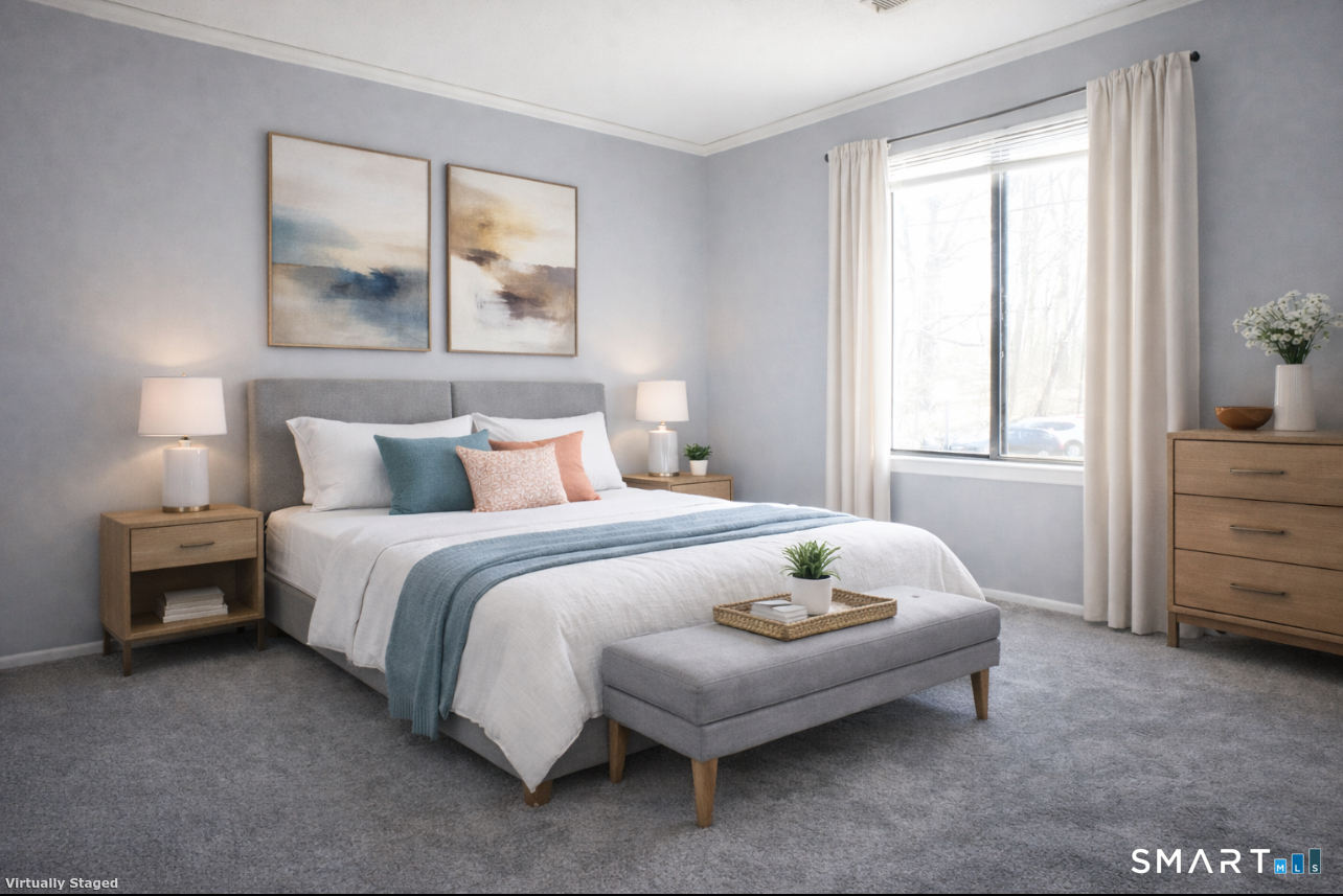 2 Juneberry Lane, Unit 2 Ridgefield, CT 06877 - Photo 14 of 29 a bedroom with a bed and window