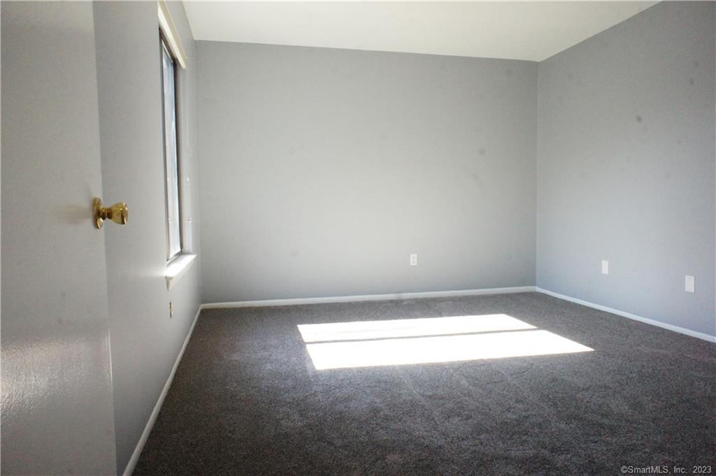 2 Juneberry Lane, Unit 2 Ridgefield, CT 06877 - Photo 19 of 29 a view of empty room