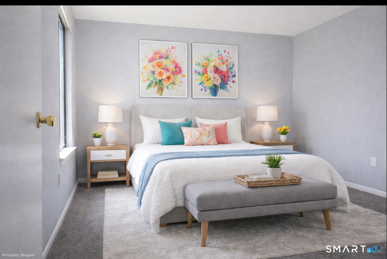 2 Juneberry Lane, Unit 2 Ridgefield, CT 06877 - Photo 20 of 29 a bedroom with furniture and painting on the wall