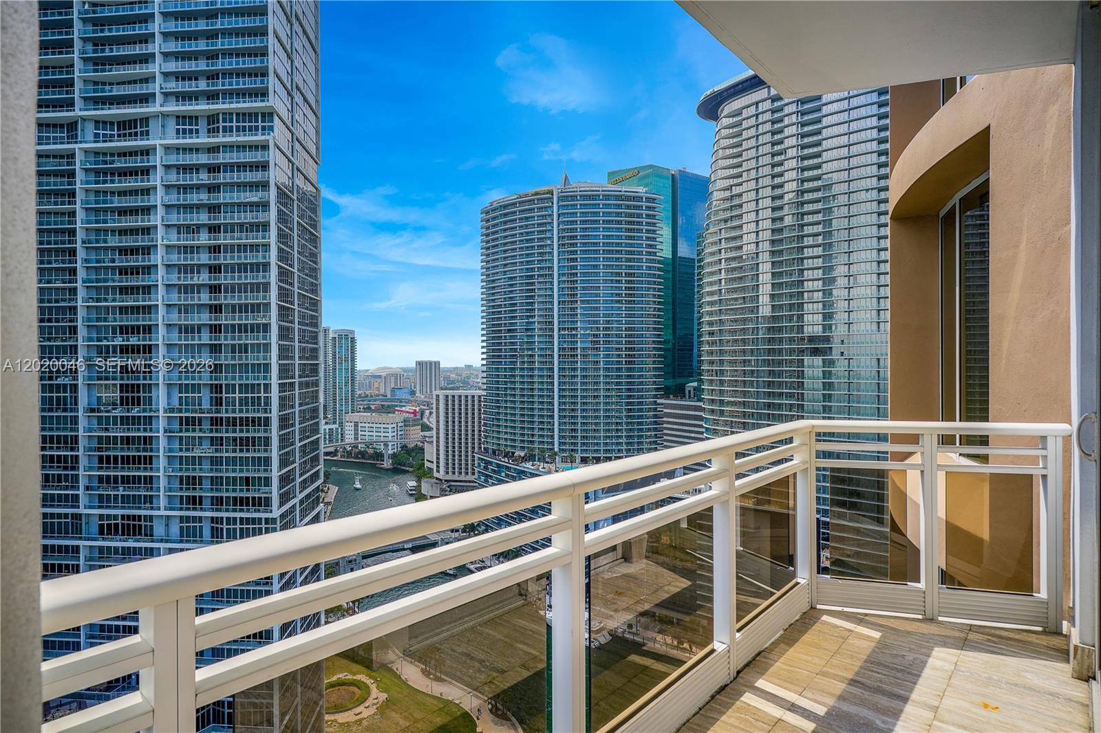 901 Brickell Key Boulevard, Unit 3204 Miami, FL 33131 - Photo 25 of 55 a view of a balcony with a floor to ceiling window