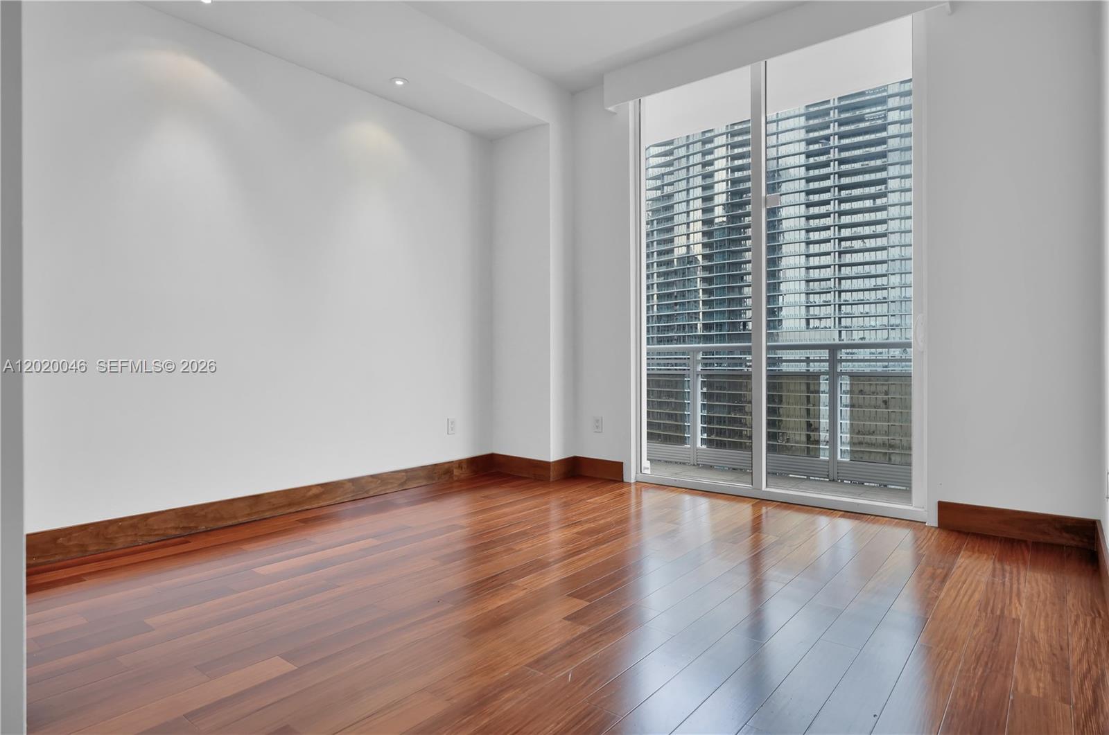 901 Brickell Key Boulevard, Unit 3204 Miami, FL 33131 - Photo 31 of 55 a view of wooden floor and brick walls