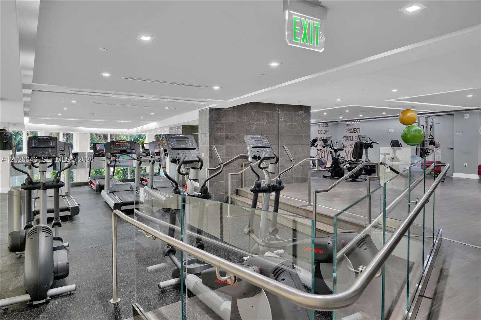 901 Brickell Key Boulevard, Unit 3204 Miami, FL 33131 - Photo 38 of 55 a view of a room with gym equipment