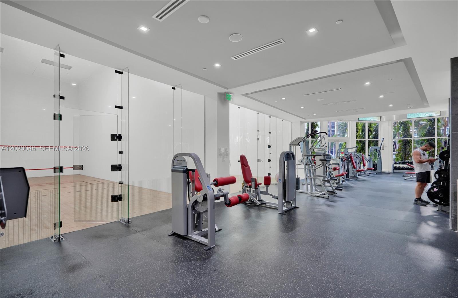 901 Brickell Key Boulevard, Unit 3204 Miami, FL 33131 - Photo 42 of 55 a view of a room with gym equipment