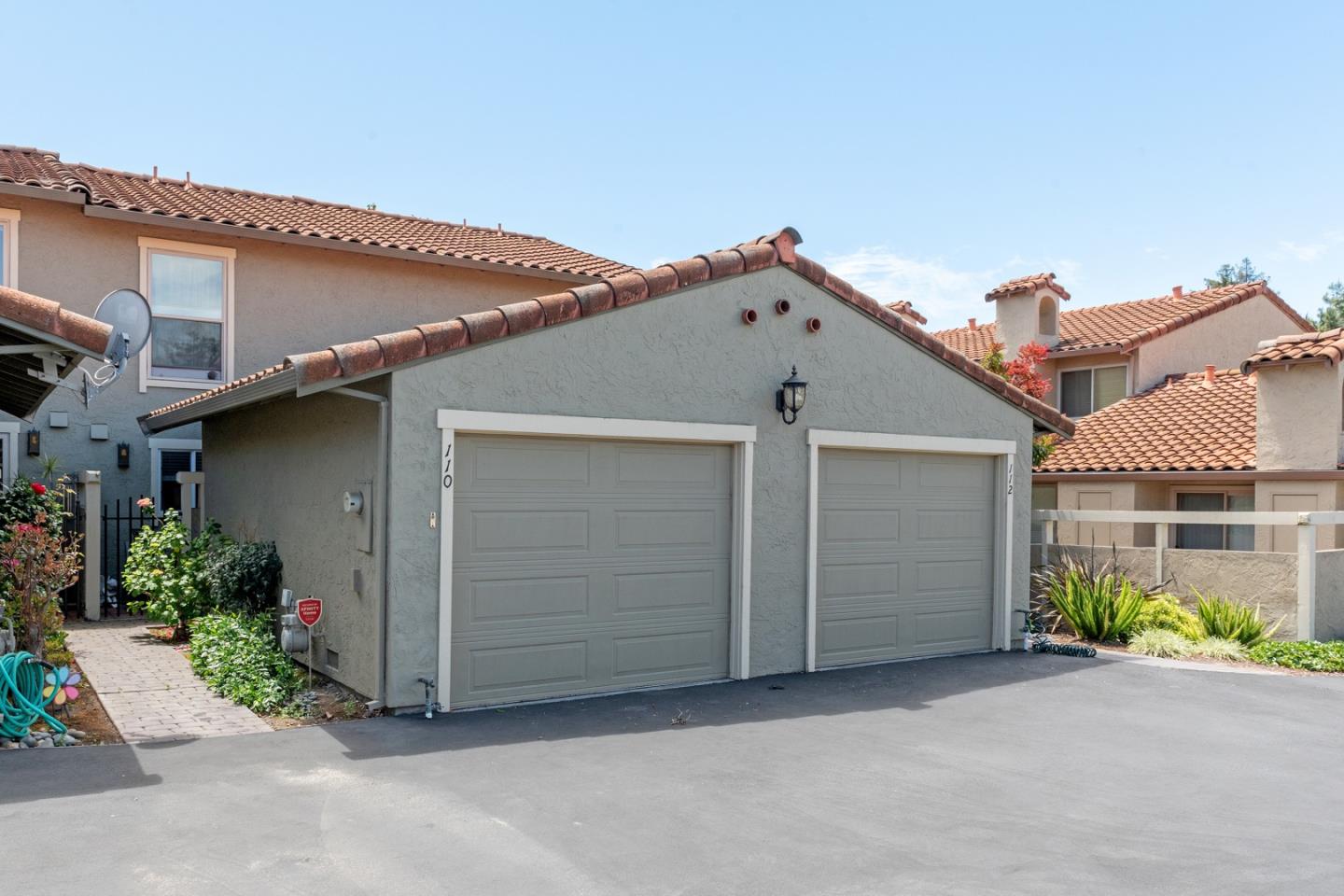 110 Salice Way Campbell, CA 95008 - Photo 1 of 14 a front view of a house with garage