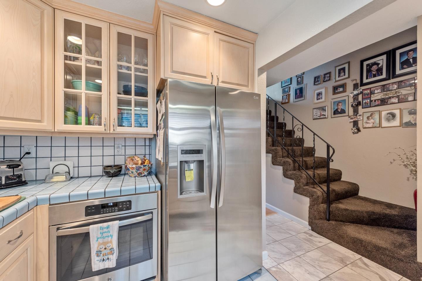 110 Salice Way Campbell, CA 95008 - Photo 7 of 14 a kitchen with stainless steel appliances granite countertop a refrigerator and a sink