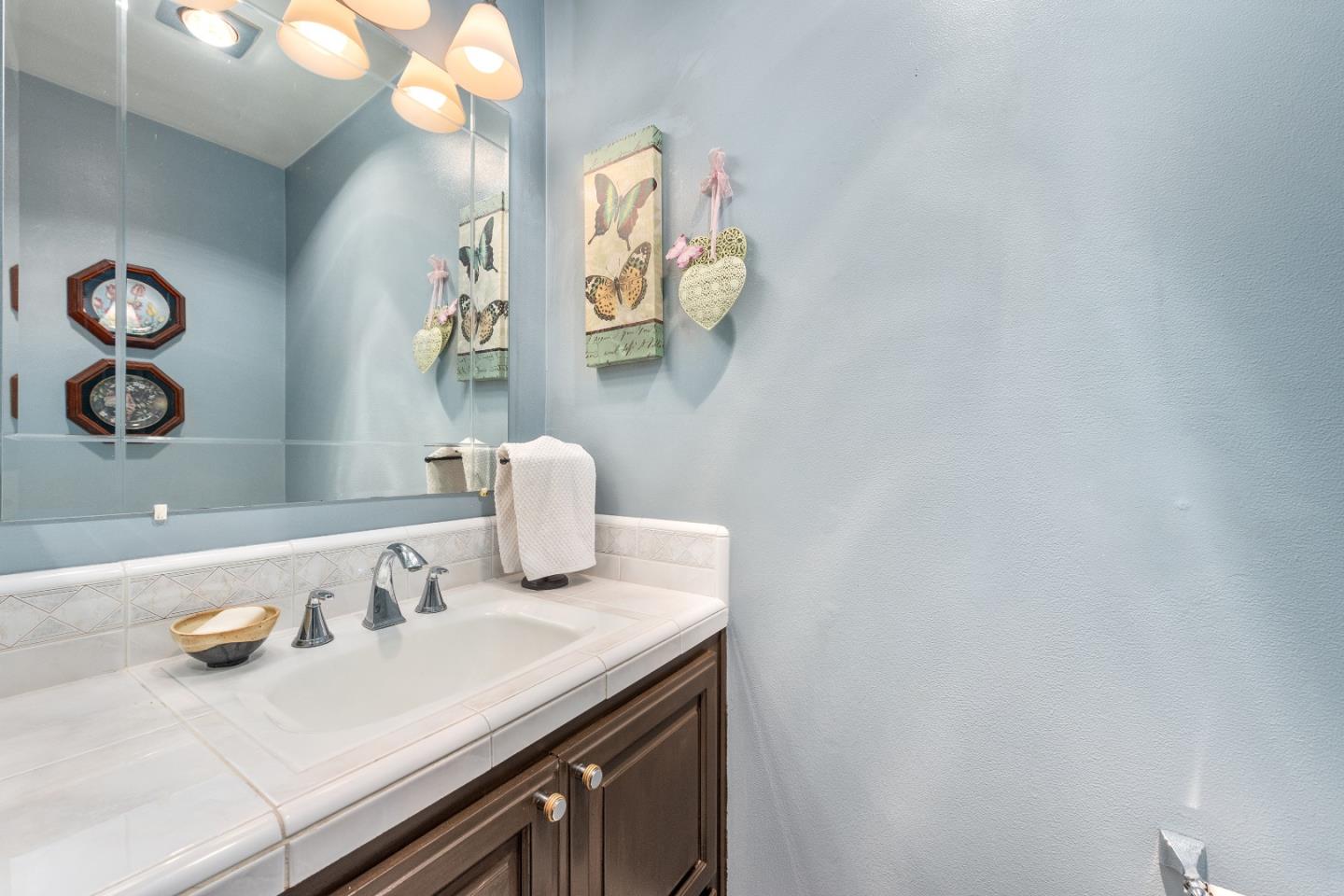 110 Salice Way Campbell, CA 95008 - Photo 8 of 14 a bathroom with a sink and a mirror
