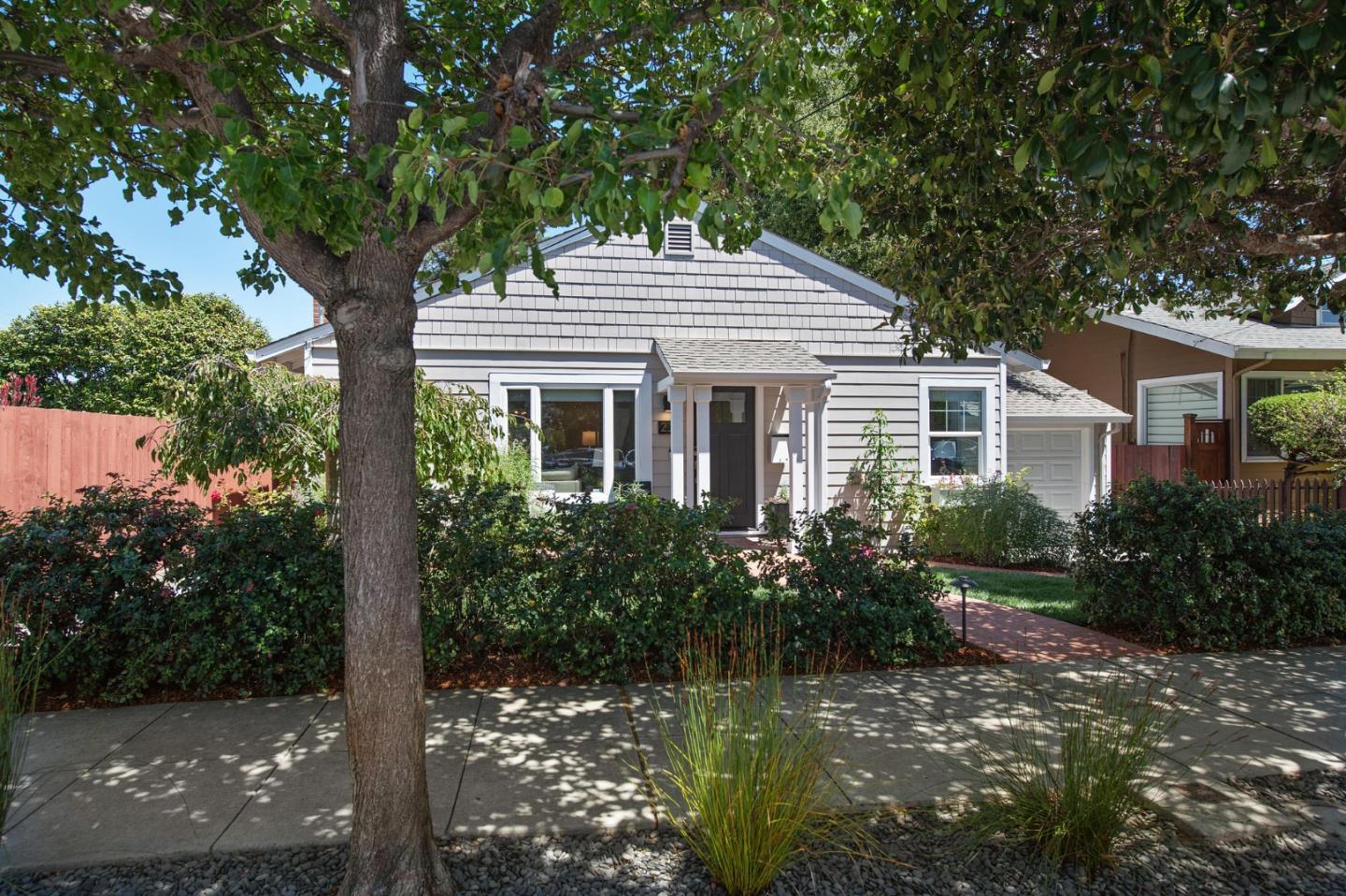 232 Bancroft Road Burlingame, CA 94010 - Photo 11 of 69 a front view of a house with garden