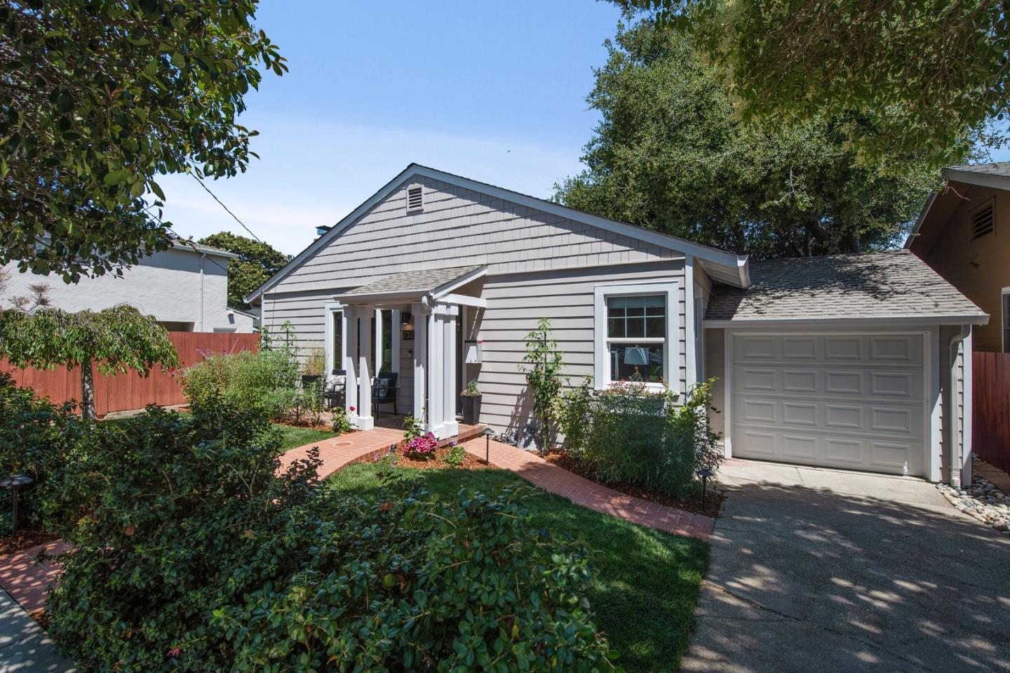 232 Bancroft Road Burlingame, CA 94010 - Photo 12 of 69 a front view of a house with yard and green space