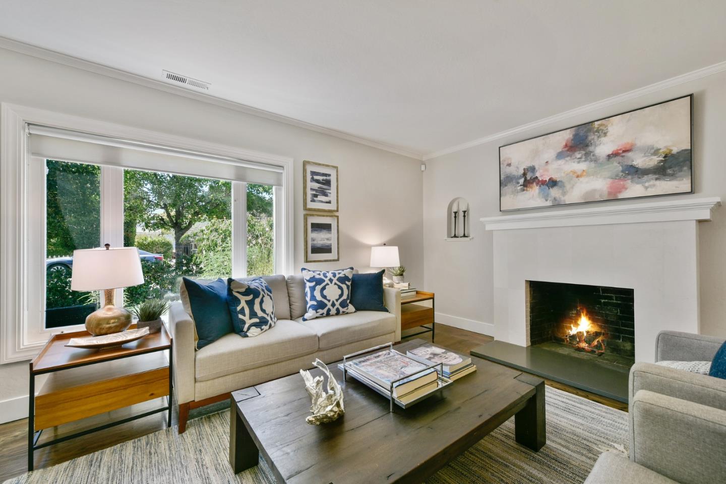 232 Bancroft Road Burlingame, CA 94010 - Photo 17 of 69 a living room with furniture and a fireplace