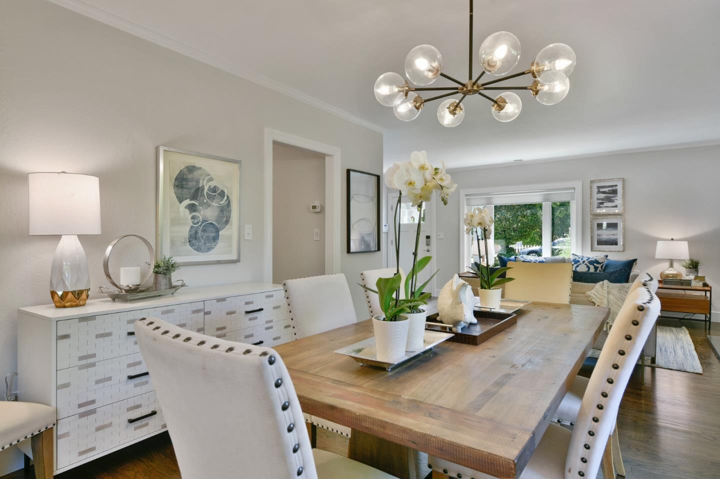 232 Bancroft Road Burlingame, CA 94010 - Photo 23 of 69 a view of a dining room with furniture and wooden floor