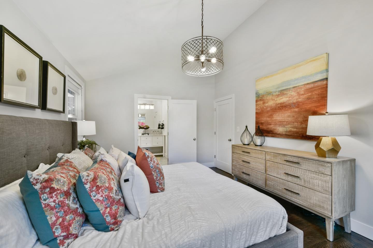 232 Bancroft Road Burlingame, CA 94010 - Photo 39 of 69 a bedroom with a bed and wooden floor