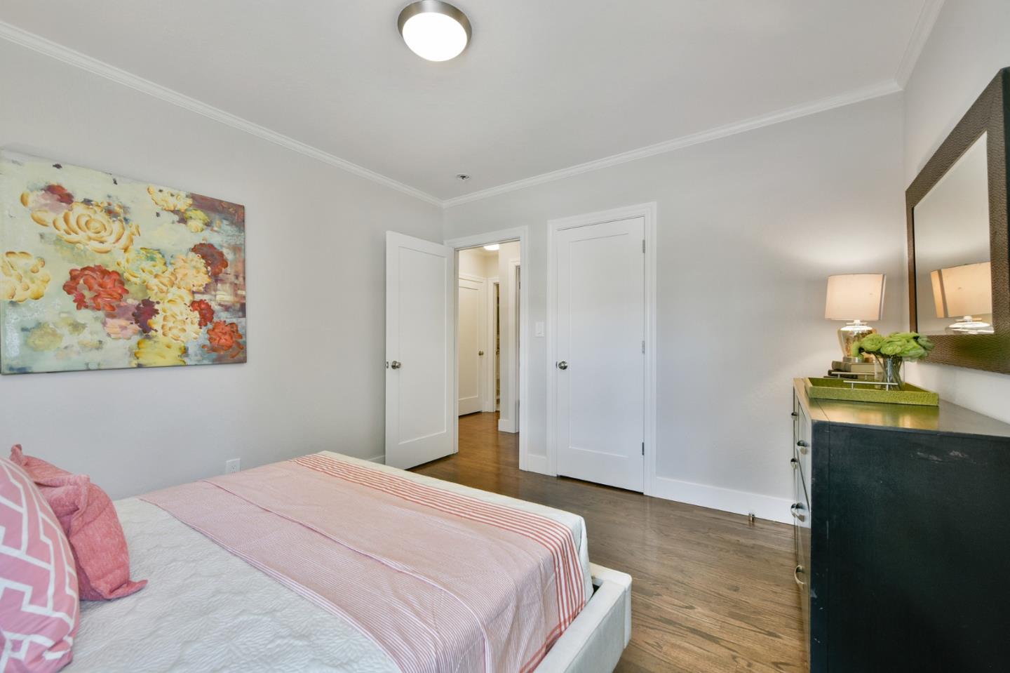 232 Bancroft Road Burlingame, CA 94010 - Photo 45 of 69 a bedroom with a bed and a dresser