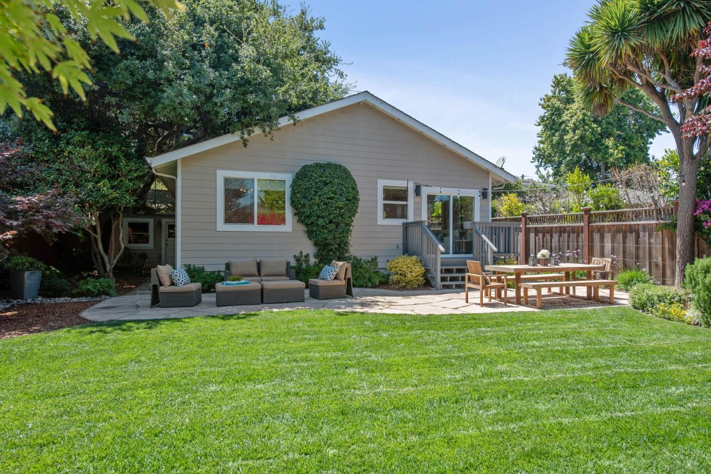 232 Bancroft Road Burlingame, CA 94010 - Photo 53 of 69 a view of a house with a yard and sitting area