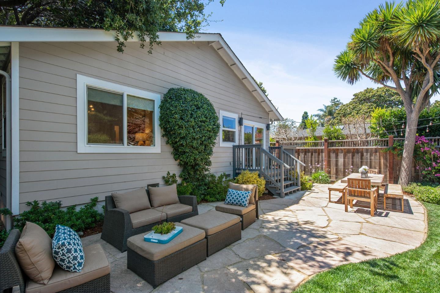 232 Bancroft Road Burlingame, CA 94010 - Photo 57 of 69 a view of a patio with couches table and chairs and potted plants