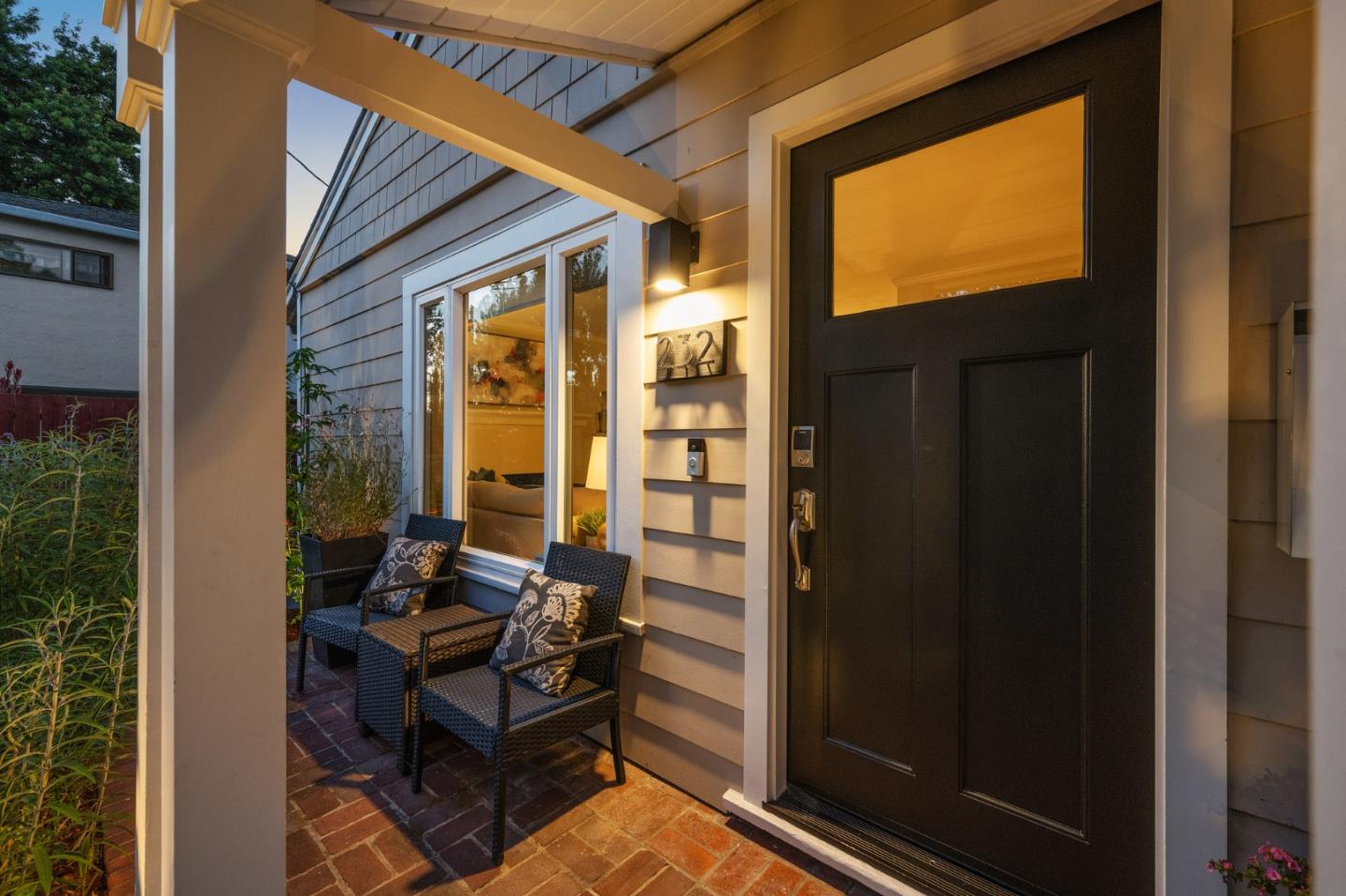 232 Bancroft Road Burlingame, CA 94010 - Photo 7 of 69 a view of a balcony with chair and front door