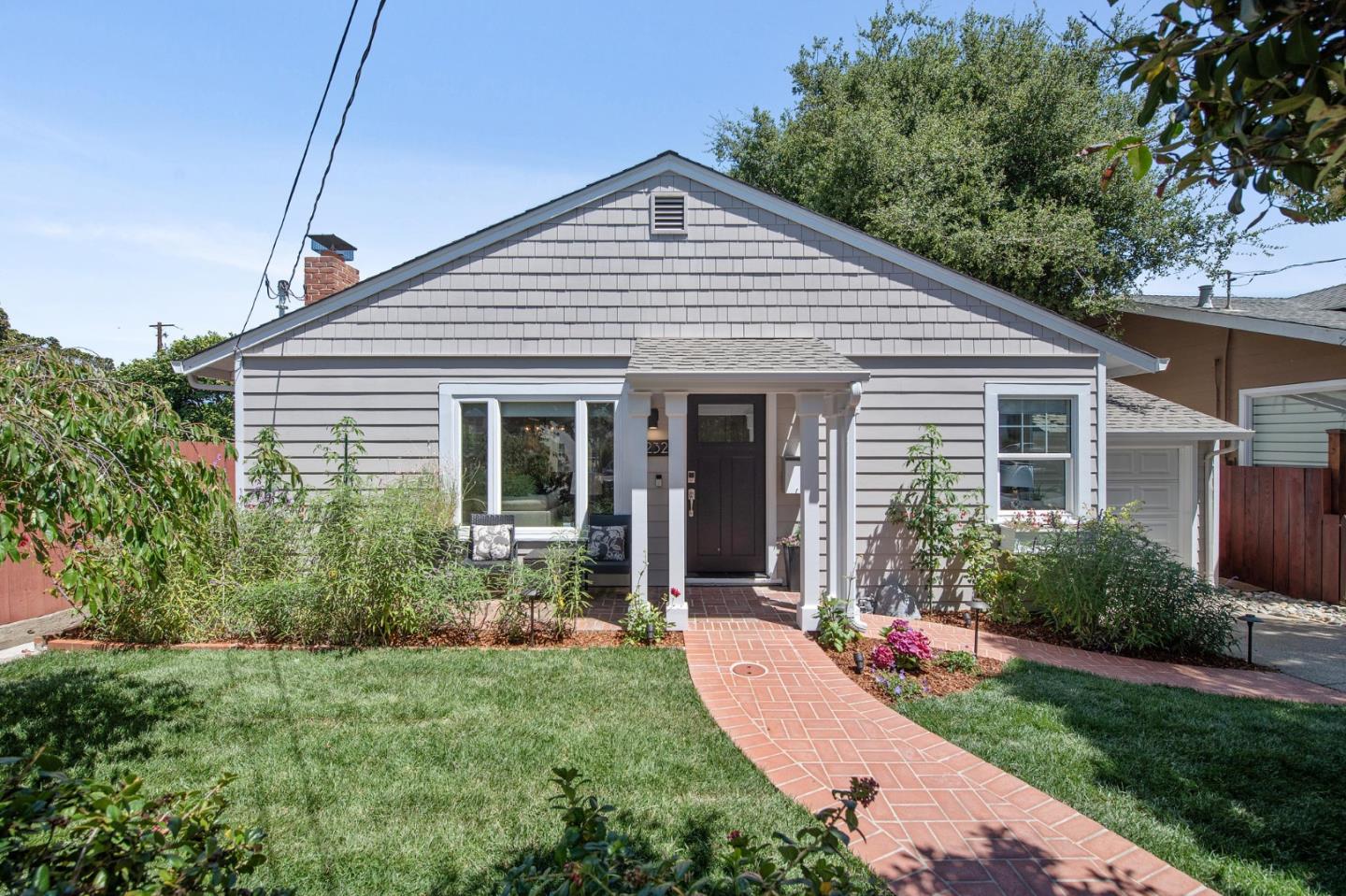 232 Bancroft Road Burlingame, CA 94010 - Photo 9 of 69 a front view of a house with garden