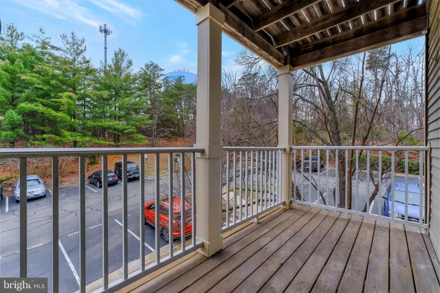 a view of a two chairs on the deck