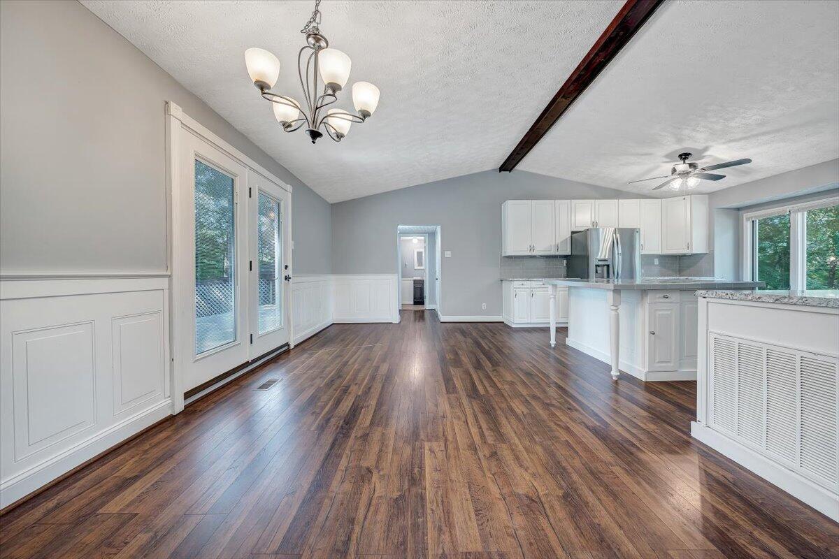 80 Walnut Landing Circle Hardy, VA 24101 - Photo 11 of 34 a view of a kitchen with wooden floor and a kitchen