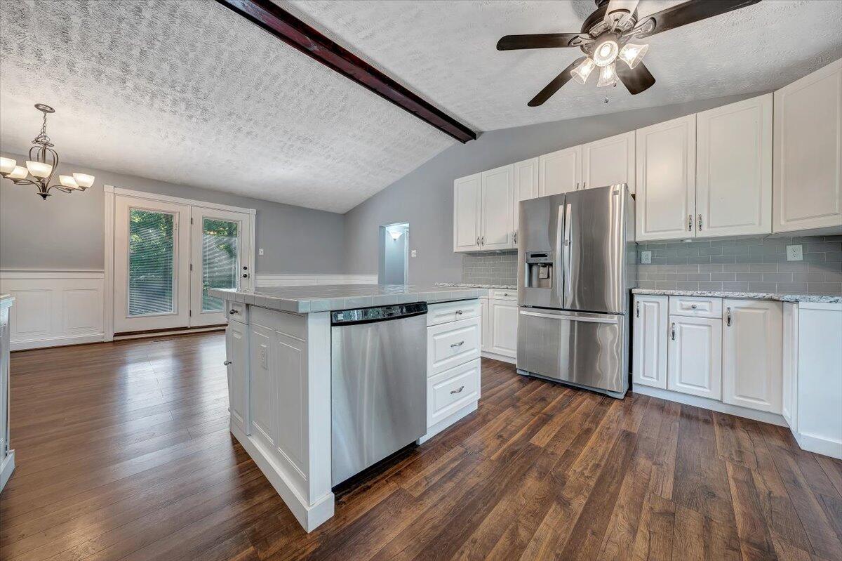 80 Walnut Landing Circle Hardy, VA 24101 - Photo 16 of 34 a kitchen with a refrigerator and white cabinets
