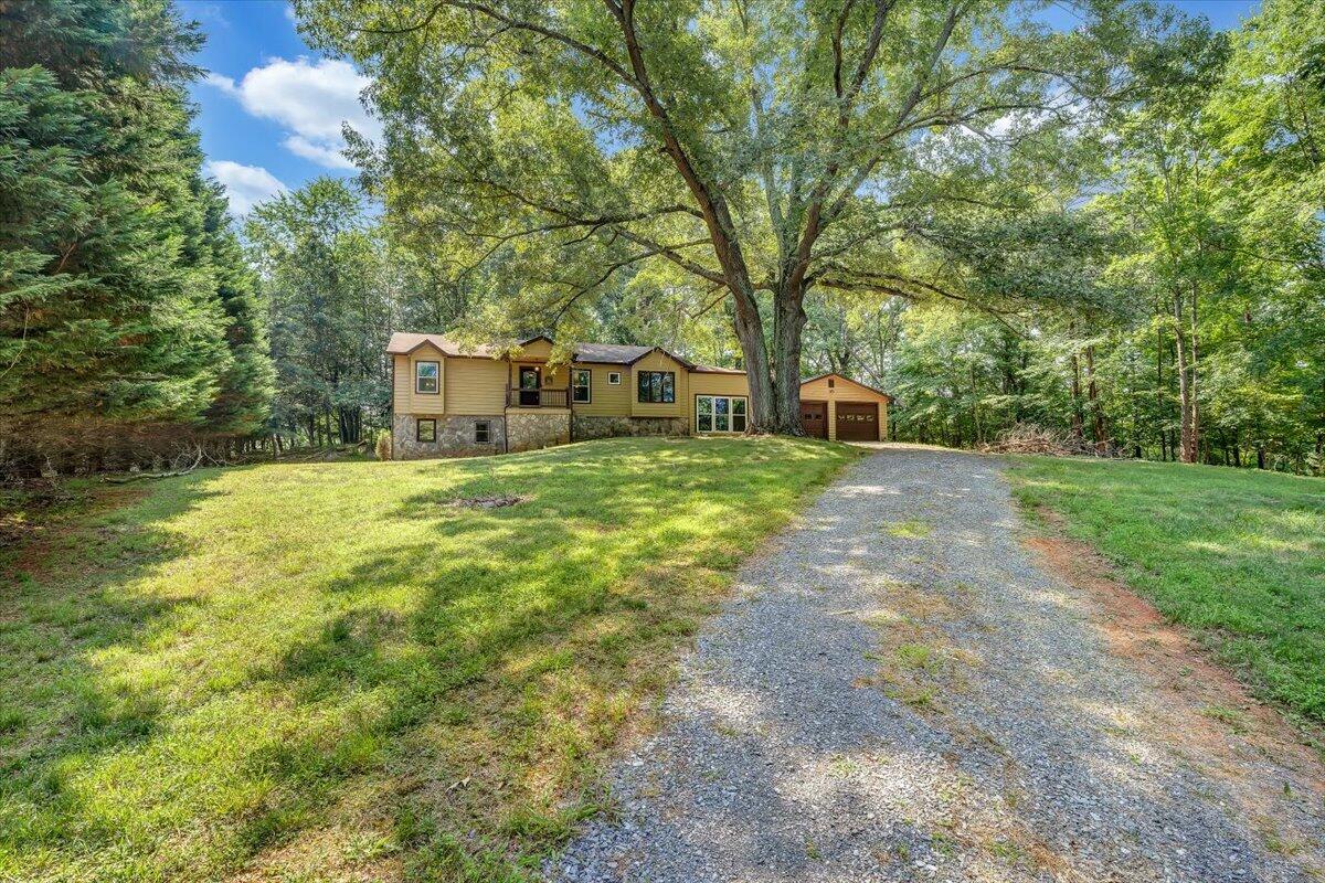 80 Walnut Landing Circle Hardy, VA 24101 - Photo 3 of 34 a view of a house with a yard