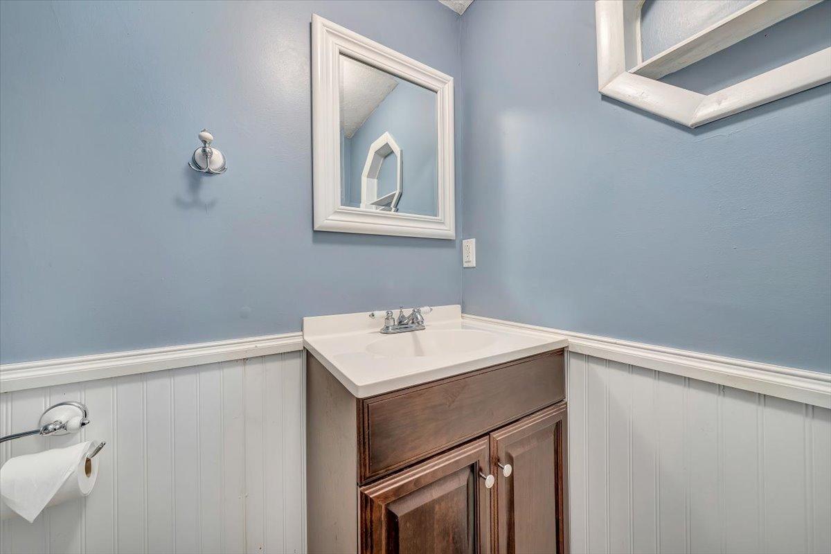 80 Walnut Landing Circle Hardy, VA 24101 - Photo 25 of 34 a bathroom with a sink vanity and a mirror