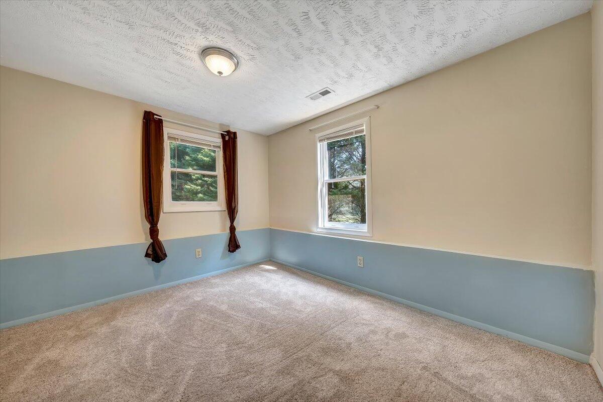 80 Walnut Landing Circle Hardy, VA 24101 - Photo 26 of 34 an empty room with windows