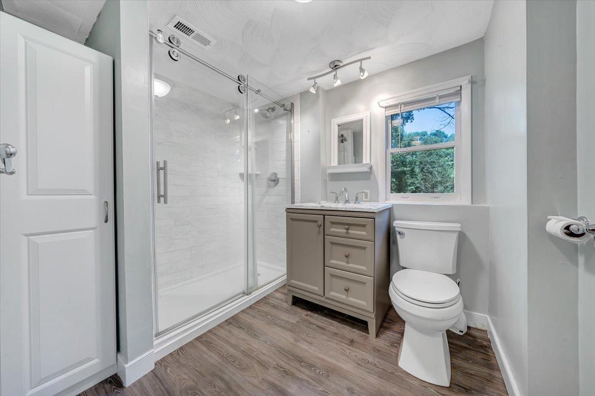 80 Walnut Landing Circle Hardy, VA 24101 - Photo 28 of 34 a bathroom with a toilet sink and a mirror
