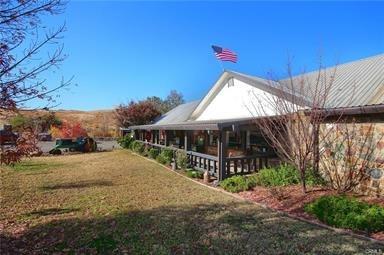7428 Hornitos Road Hornitos, CA 95325 - Photo 3 of 46 a front view of a house with yard and garage