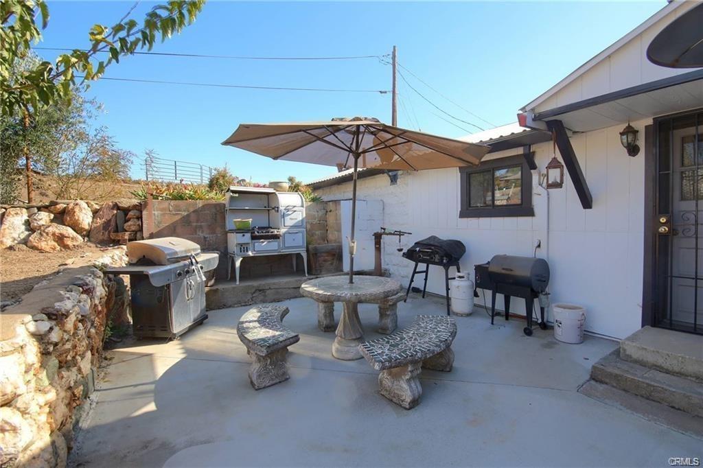 7428 Hornitos Road Hornitos, CA 95325 - Photo 31 of 46 a view of a patio with couches and potted plants