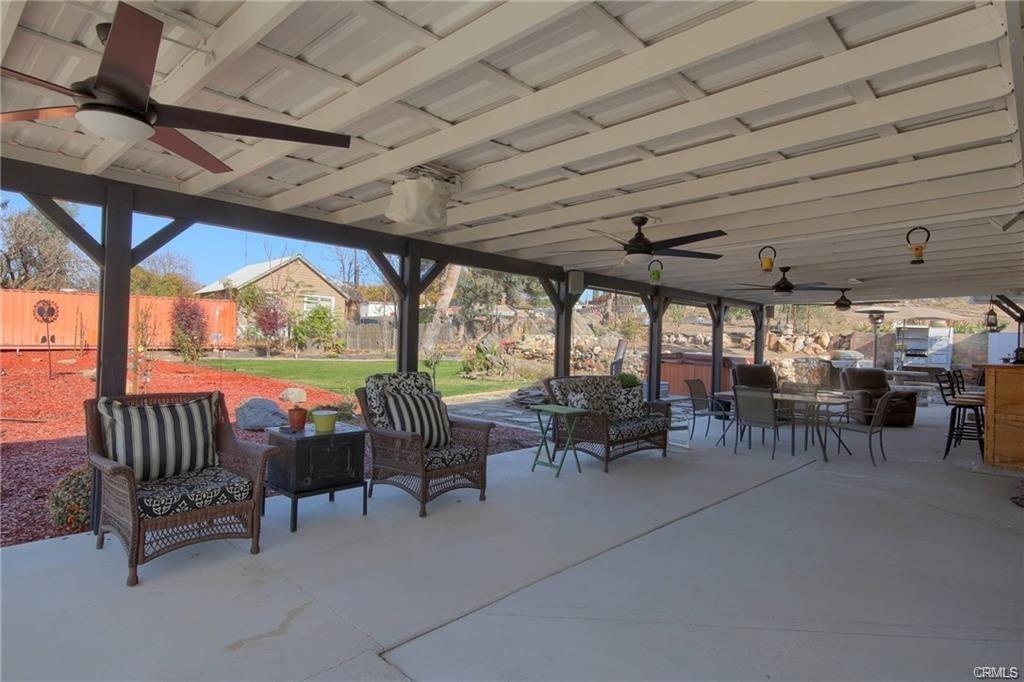 7428 Hornitos Road Hornitos, CA 95325 - Photo 36 of 46 a view of a patio with chairs and a table