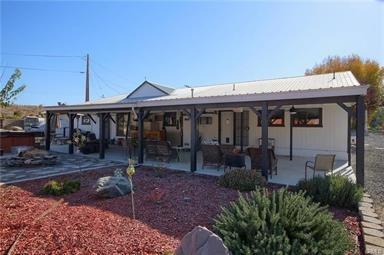 7428 Hornitos Road Hornitos, CA 95325 - Photo 5 of 46 a front view of a house with garden