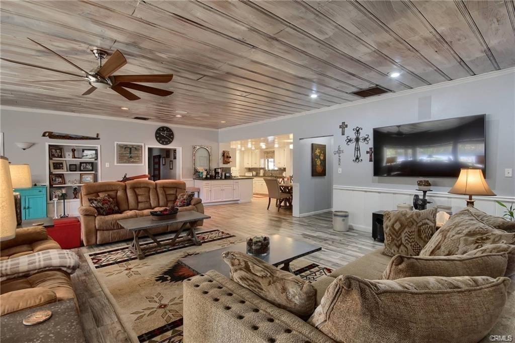 7428 Hornitos Road Hornitos, CA 95325 - Photo 9 of 46 a living room with furniture and a flat screen tv