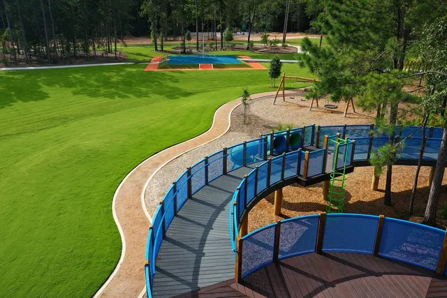 a view of a park with swings