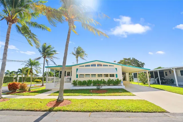 a view of a house with a swimming pool