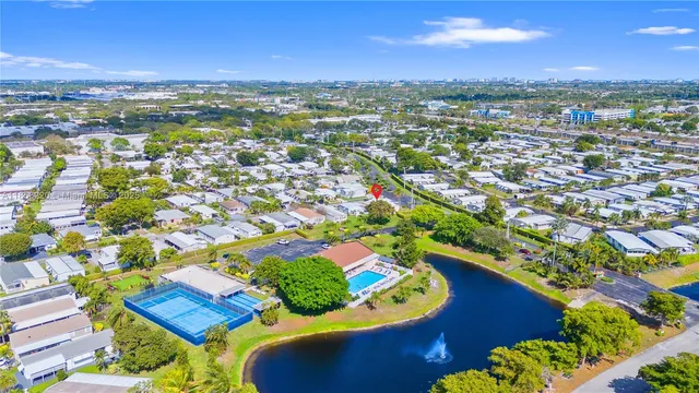 a view of multiple houses with a street